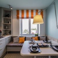 Striped roman curtains on the kitchen window