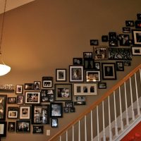 Staircase with photos in a private house