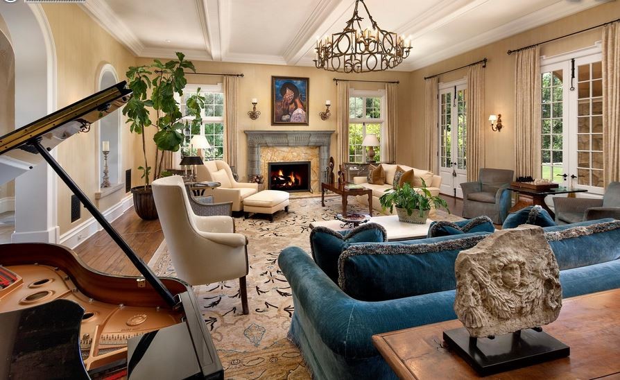 Dark blue sofa in the interior of a classic Italian living room