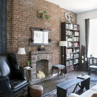 Wooden bench in front of the fireplace in the living room