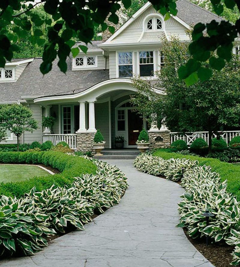 Curved path to the front door of a private house