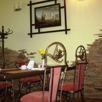 Wrought iron chairs at the dining table