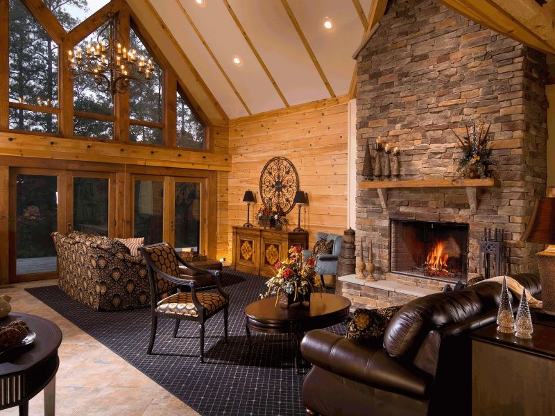 Fireplace with artificial stone cladding in the living room of a country house