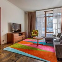 Bright triangles on the carpet in the living room