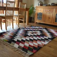 Fringed Carpet on Dining Room Floor