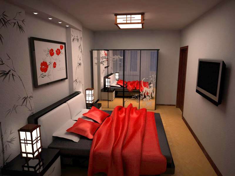 Red bedspread in a bedroom with gray walls