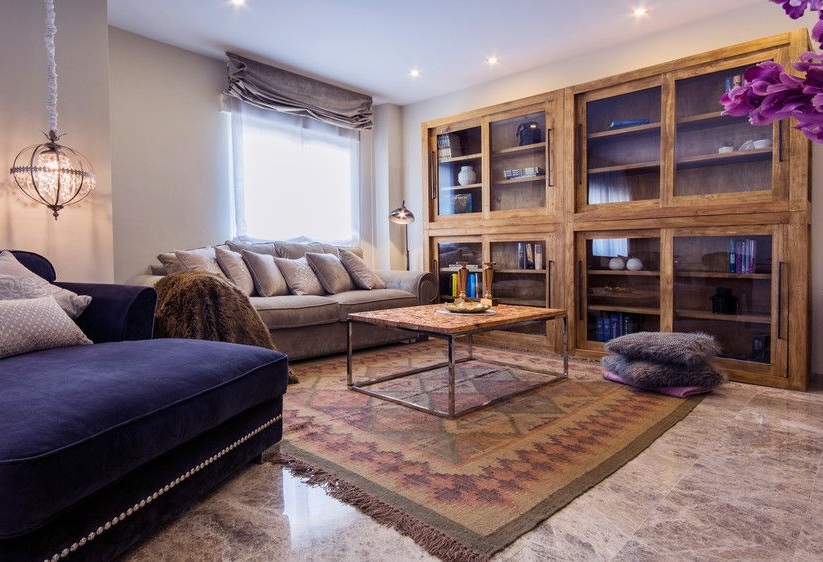 Wooden furniture in the interior of the Spanish living room