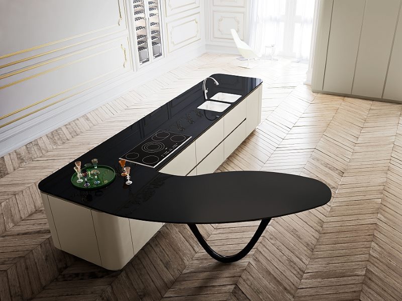 Kitchen island with a black surface of irregular shape