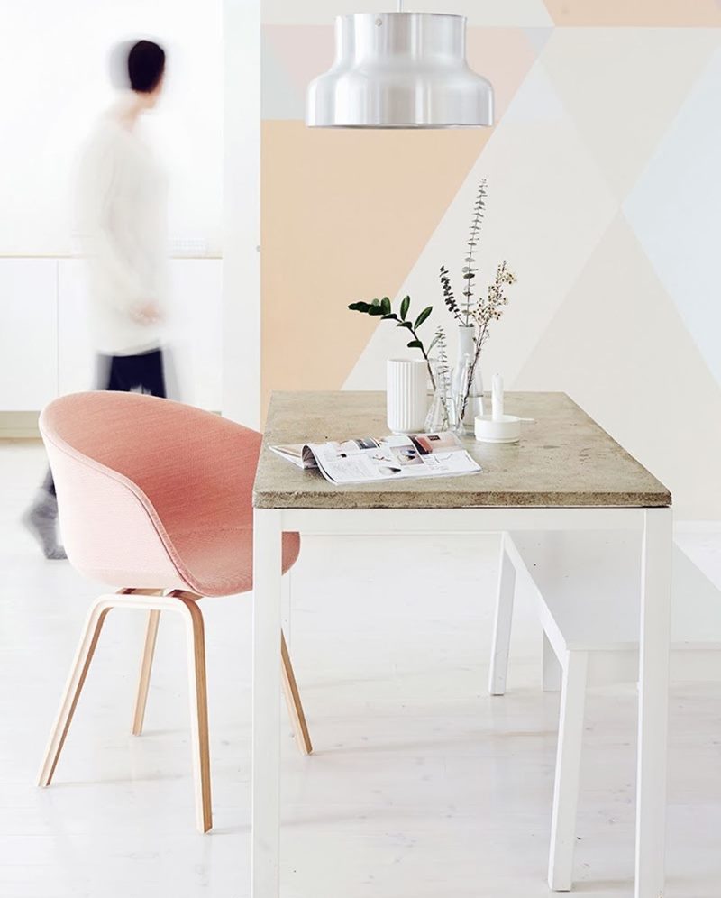 Pink armchair in a minimalist style living room