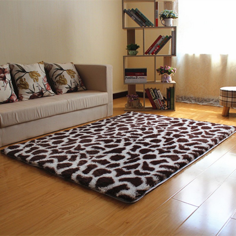 Thick spotted carpet on the laminate floor