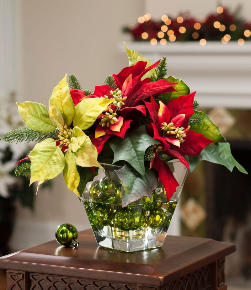 Glass vase with artificial flowers