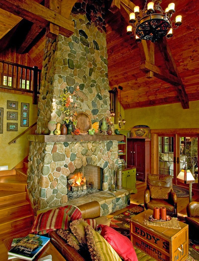 Stone fireplace in the living room with a high ceiling