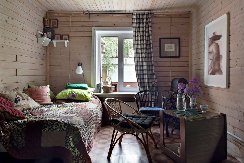 Interior of a room in a house with wooden walls