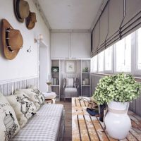 Old hats as a decor of the balcony