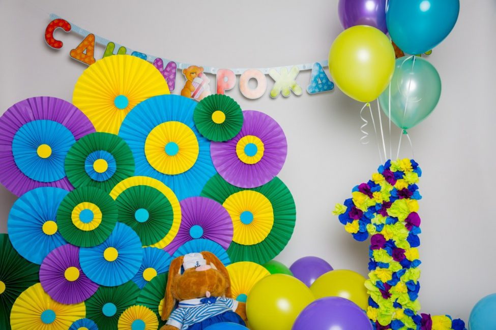 Colorful fans on the wall of a nursery