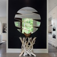 Stylish mirror composition in the living room of a country house