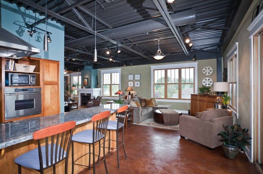 Spacious living room with iron beams on the ceiling