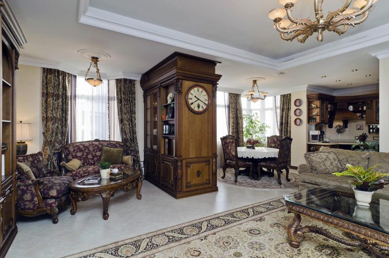 Clock on a wooden cabinet in a spacious living room