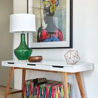 Stylish table in the hallway of a private house