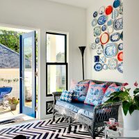 Black and white striped carpet on the living room floor.