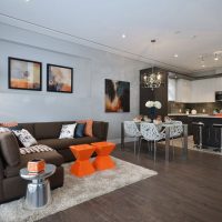 Zoning of the kitchen-living room with flooring