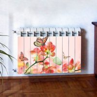 Butterflies with flowers on a heating radiator