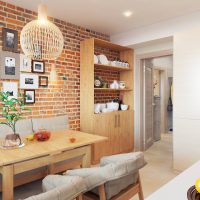 Brick wall in the kitchen of a panel house apartment