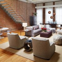 Spacious living room interior with staircase