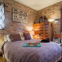 Brick walls in bedroom interior