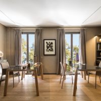 kitchen-dining room with two dining tables