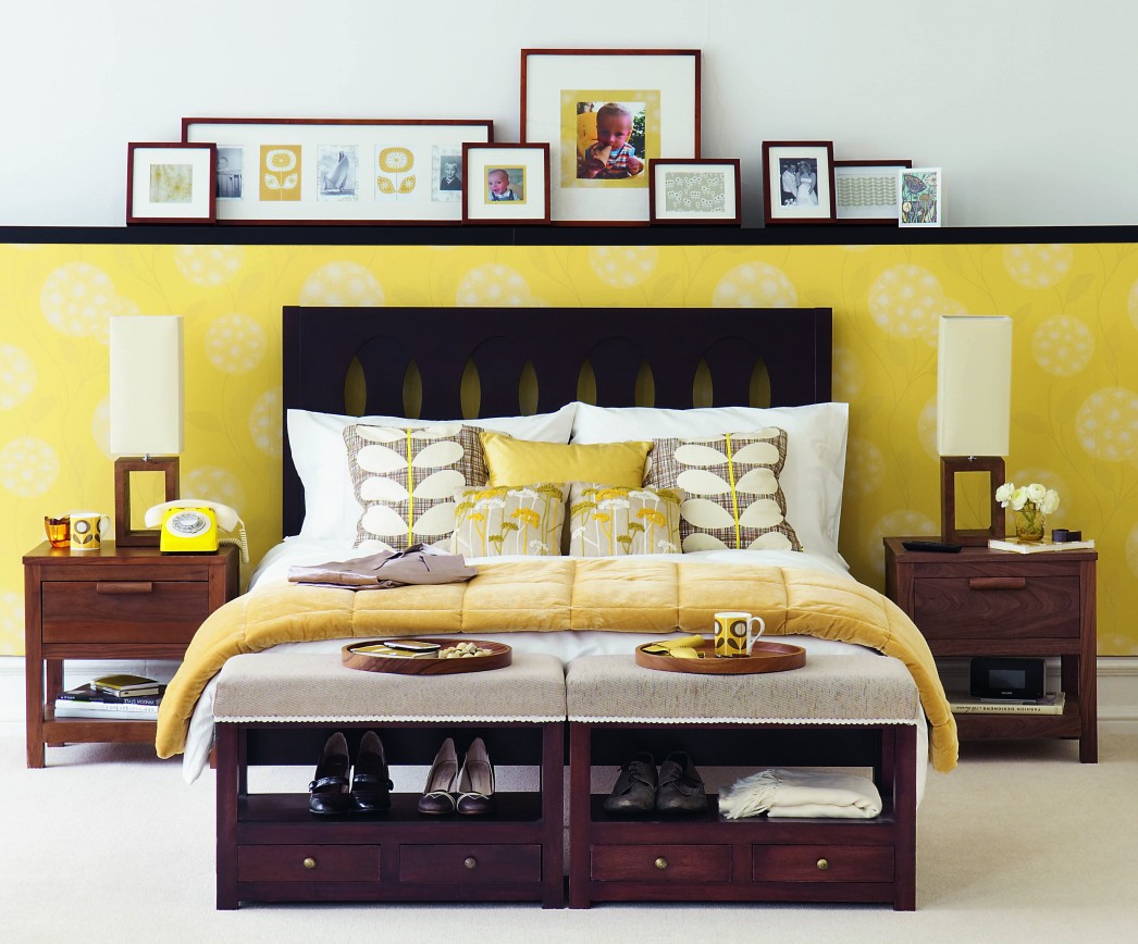 Yellow and white wallpaper in the bedroom interior