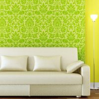 The combination of green wallpaper with a yellow wall