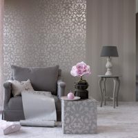 Gray lounge chair with vinyl wallpaper