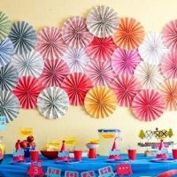 Paper flowers on a nursery wall