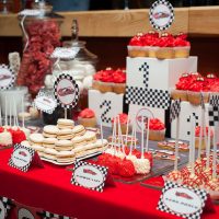 Red tablecloth on a table for sweets