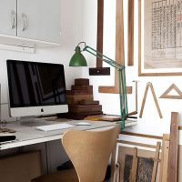 Green lamp on a computer desk