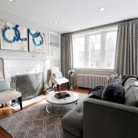 Gray living room interior with fireplace