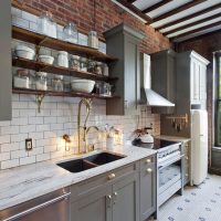 Cookware on open shelves.