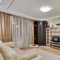 Beige curtains on the living room window