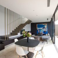 White ceiling in the living room with stairs