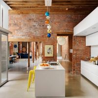 White furniture in the loft style kitchen