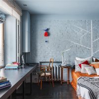 Blue brick wall in the bedroom