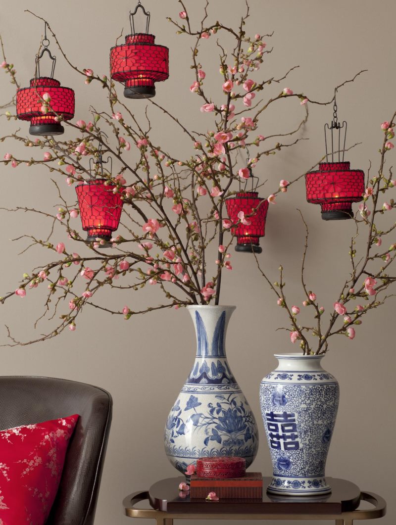 Two Chinese vases on a wooden table