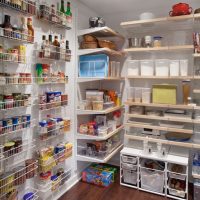 Wire baskets on the wall of the pantry