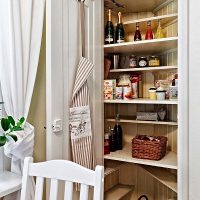 Bottles and drinks on the shelves of the pantry