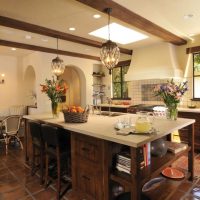 Fresh flowers in the interior of a spacious kitchen