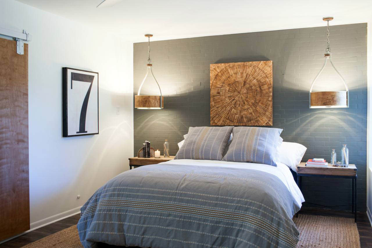 Gray brick wall in a modern bedroom