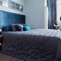 Gray bedspread in teenager’s bedroom