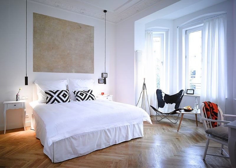 Bedroom interior in a two-room apartment with a balcony