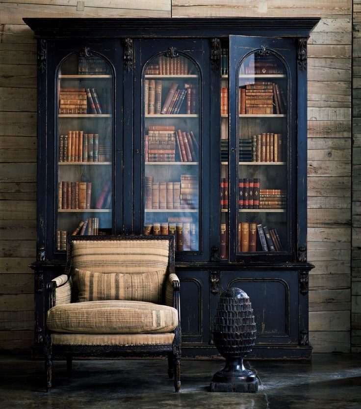 Old grandmother's bookcase with a book collection